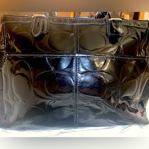 Patent coach classic logo with silver hardware-used but good condition